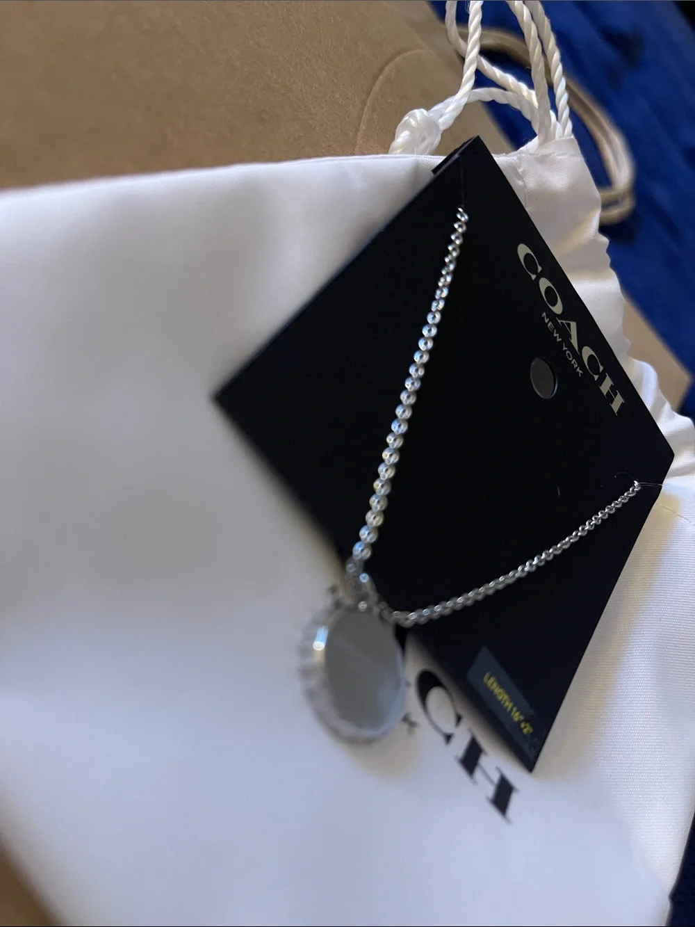 Coach Silver Disc Logo Necklace
